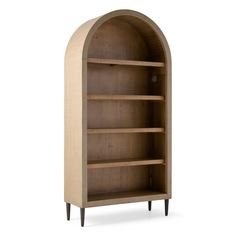 an arch shaped bookcase with wooden shelves