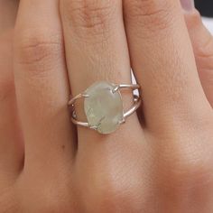 Prehnite Ring / 925 Sterling Silver Ring / Crystal Ring / Women Silver Ring / Cabochon Gemstone Jewelry / Anniversary Gift Gemstone Name - Prehnite  Stone Quality - AAA Ring Wight - 3.8 gm  Ring Length - 1.4 cm  Ring Width - 1 cm  Stone Shape - as shown in the picture Ring Size - All Ring Size Available You'll get the exact product as shown in the pictures We serve complete 925 sterling silver Jewelry and genuine properties of the stone. The products are dispatched from the small business from USA. Product Quality and Packaging - Our all products are 925 Silver Stamped which shows that the product is genuine and authentic .The products are dispatched from the small business from USA so you get the product on time and the product packaging comes in bubble foil wrap with all the precautions Prehnite Gemstone Ring Jewelry, Prehnite Ring Jewelry Gift, Prehnite Ring Suitable For Gift, Prehnite Ring Jewelry For Gifts, Gift Prehnite Ring Jewelry, Prehnite Ring, Picture Ring, Ring Crystal, Crystal Ring