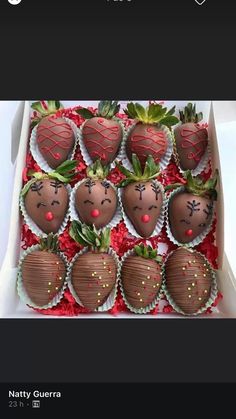 chocolate covered strawberries are arranged in a box