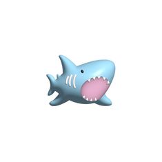 a toy shark with its mouth open on a white background in the shape of a fish