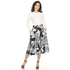 Indulge in timeless elegance with our Women's Leaf Print Vintage Flared Midi Skirt. Crafted with meticulous attention to detail, this skirt seamlessly combines style and functionality. The charming leaf print adds a touch of vintage flair, ensuring you stand out with every step. Midi Sweater Skirt, Flared Midi Skirt, Midi Flare Skirt, Vintage Flare, Slip Skirt, Navy Gray, Women Maxi, White Mark, Knit Midi