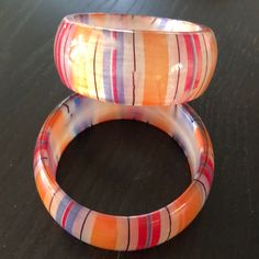 Striped Acrylic Bracelets Apx. 1.25” Wide. Great Paired Together Or With Others! Priced Per Bracelet. Retro Multicolor Bangle Bracelets, Red Plastic Bracelet Jewelry, Trendy Red Plastic Bracelets, Trendy Red Plastic Bracelet, Multicolor Round Retro Jewelry, Trendy Orange Plastic Jewelry, Retro Multicolor Round Jewelry, Multicolor Retro Bracelets For Gift, Multicolor Retro Bracelet For Gift