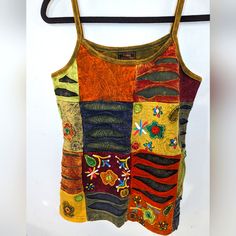 Another Boho Style Y2k Top! Bohemian Orange Patchwork Tops, Orange Cotton Festival Top, Multicolor Patchwork Casual Tank Top, Multicolor Cotton Patchwork Tank Top, Casual Multicolor Patchwork Tank Top, Yellow Hippie Cotton Top, Orange Hippie Tops For Festival, Fitted Orange Patchwork Top, Orange Hippie Top For Festival