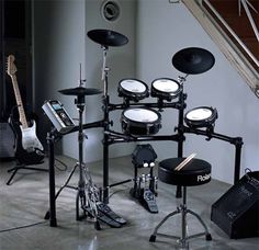 a set of musical instruments sitting on top of a floor