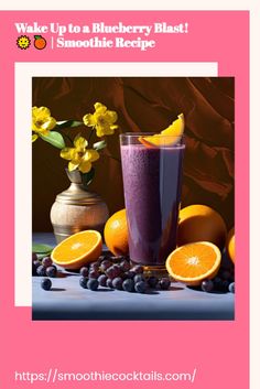 an orange and blueberry smoothie in a tall glass next to some fruit on the table