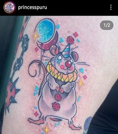 an image of a tattoo with a rat holding a balloon