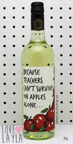 a bottle of apple cider sitting on top of a table