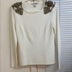 Forever21 Embellished Top With Removable Shoulder Pads. Cream Color Size Small. Never Been Worn But No Tags. Special Piece! Chic Fitted Top With Embellished Collar, Chic Fitted Tops With Embellished Collar, Chic Embellished Stretch Tops, Chic Stretch Embellished Tops, Forever 21 Fitted Sequin Tops, Fitted Sequin Tops From Forever 21, Forever 21 Glamorous Fitted Tops, Glamorous Fitted Tops From Forever 21, Glamorous Fitted Forever 21 Tops