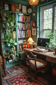 a home office with lots of bookshelves and plants on the desk in front of it