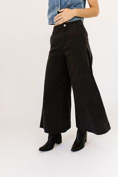 a pair of black wide-leg pants that are sooo good, you’ll never want to take them off. the high-rise + fitted waistline gives it “business casual” charisma, while the flowy loose legs keep things real + relaxed. full of versatility, you can dress them up or down for any occasion. black // wide leg, high waisted, one button zip fly, belt loops, pockets paired with our matilda mesh top + lover denim vest model is 5'8" + wearing a small measurements are approximate + taken while laying flat small : Chic Wide Leg Washed Black Flare Jeans, Chic Wide Leg Flare Jeans In Washed Black, Relaxed Fit Wide Leg Workwear Pants, Washed Black Wide-leg Pants For Fall, Versatile Wide Leg Business Casual Pants, Versatile Wide Leg Pants For Business Casual, Washed Black Relaxed Fit Work Pants, Versatile Business Casual Wide Leg Pants, Mid-rise Flare Jeans In Washed Black For Work