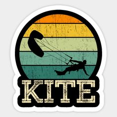 a sticker that says kite with a person parasailing