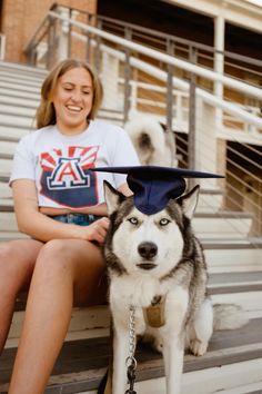 a woman sitting on the bleachers with her husky dog wearing a graduation cap