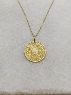 "14K Real Solid Gold Necklace, Hallmarked on the back of your pendant for certification! ▪️ A beautiful and clean engraved Sun Flower pendant made out of 14K Solid Real Gold. Available only in yellow gold! Pendant Thickness: 0.50mm Jump Ring inner diameter: 4mm Dimensions - Small - 13x13mm / 0.51 x 0.51 inches Medium - 14x14mm / 0.55 x 0.55 inches Big - 15x15mm / 0.59 x 0.59 inches Necklace Length - You can choose your chain length from 35CM to 50CM. The pendant is available alone without a chai 14k Gold Round Birth Flower Jewelry, Gold Hallmarked Flower-shaped Jewelry, Yellow Gold Medallion Necklace With Birth Flower, 14k Gold Engraved Flower Pendant Jewelry, Yellow Gold Pendant Jewelry With Flower Charm, Handmade Yellow Gold Flower-shaped Necklace, Yellow Gold Flower-shaped 14k Stamped Jewelry, Yellow Gold-plated Jewelry With Birth Flower Detail, Yellow Gold Plated Flower Jewelry