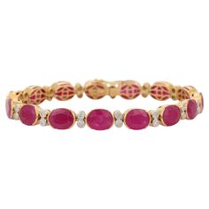 This Ruby and Diamond Bracelet in 18K gold showcases 29.6 carats of endlessly sparkling natural ruby and 1.3 carats of diamond. It measures 7.5 inches long in length. Ruby improves mental strength. Designed with oval cut ruby and diamond set in solid gold settings to make you stand out on any occasion or event. The elegant style complements the attire beautifully and is a perfect july birthstone bracelet, Engagement Gift, Bridal Shower Gift, Gift For Love, Gift For Sister, Mother Daughter Gift, Bracelet Tennis, Ruby Bracelet, Mother Daughter Gifts, Birthstone Bracelets, Daughter Gifts, Diamond Sizes, Sister Gifts, Engagement Gifts, Gemstone Bracelet