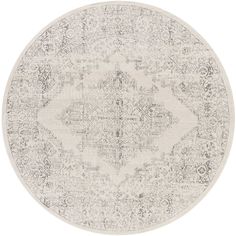 a round rug with an ornate design in grey and white colors on a white background