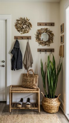 the entryway is clean and ready to be used as a place for shoes, coat racks, and plants