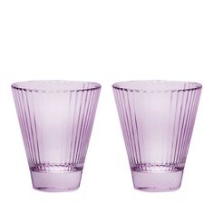 two purple glasses sitting next to each other