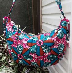 Large Hobo Fabric bag..African Wax Print Cotton..Boho.. Handmade, Machine Quilted..Pink White & Blue Floral Pattern...Zipper..Lined in Blue Bohemian Multicolor Bags With Zipper Closure, Bohemian Multicolor Bags With Zipper, Pink Bohemian Hobo Bag With Adjustable Strap, Handmade Blue Hobo Bag, Handmade Pink Hobo Shoulder Bag, Bohemian Pink Shoulder Bag For Travel, Bohemian Pink Travel Shoulder Bag, Pink Bohemian Shoulder Bag For Vacation, Pink Bohemian Shoulder Bag For The Beach