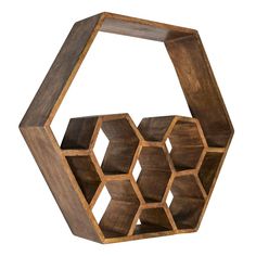 a wooden hexagonal shelf with several compartments