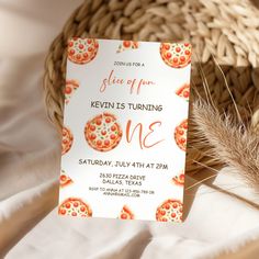 a pizza themed birthday party is set up on a table with some bread in the background