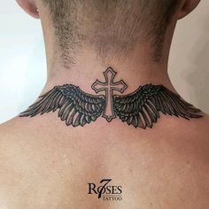 a man with a cross and wings tattoo on his neck