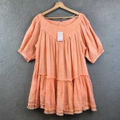 New Free People Tunic Top Orange Mystery Land Shirt Coral Size Small Condition ~The Top Is New With Tag Attached. From Nonsmoking Environment. No Stains, Snags, Pilling, Odors, Or Excessive Signs Of Wear Unless Specifically Noted. Please See The Photo For Measurements. Shipping: Fast Shipping. All Items Will Be Shipped Within 1 Business Day Of Payment (Which Excludes Weekend And Holidays). Breezy Short Sleeve Cotton Blouse, Breezy Cotton Short Sleeve Blouse, Summer Orange Cotton Blouse, Orange Cotton Blouse For Summer, Breezy Short Sleeve Blouse For Summer, Breezy Short Sleeve Blouse For Day Out, Spring Cotton Blouse For Brunch, Spring Brunch Cotton Blouse, Flowy Short Sleeve Blouse For Summer