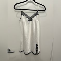 - Never Worn In Perfect Condition - Size Small - Adjustable Straps - Rare & Vintage Victoria's Secret Elegant Lace Trim Sleepwear For Vacation, White V-neck Slip Dress With Lace Trim, Chic White Slip Dress With Lace Trim, White Slip Dress With Lace Trim For Date Night, White Lace Trim Slip Dress For Loungewear, White Lace Trim Slip Dress For Date Night, Fitted White Dress By Victoria's Secret, Fitted White Victoria's Secret Dresses, Victoria's Secret White Sleeveless Dress