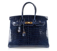 Hermes Birkin 35cm bag coveted Blue Sapphire Porosus Crocodile. This Hermes crocodile handbag in jewel toned blue sapphire is not unlike a faceted sapphire.Gorgeous with lush gold Birkin bag hardware. Porosus Hermes crocodile skin has the smallest of the scales and is the most exclusive.Comes with lock, keys, clochette, sleepers and signature Hermes box. NEW or NEVER Mightychic offers a seamless experience for Hermes Birkin online shopping and your Hermes Birkin bag purchase. final sale BAG MEASURES:LENGTH 35cm / 14" TALL 28cm / 11"DEEP 18cm / 7" HANDLES:TALL 5"CONDITION:NEW or NEVER TIDS 'n BITS ﻿An Hermes Birkin bag is an investment and over the decade has superseded the stock market! It is an exciting and unique experience to delve into the World of Hermes. Whether your very first Birki Hermes Crocodile, Crocodile Handbags, Hermes Birkin 35, Bag Hardware, Crocodile Skin, Hermes Bags, Hermes Bag, Hermes Birkin, Blue Bags