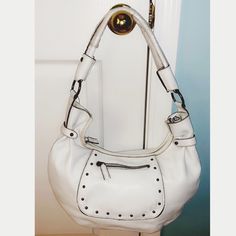 New Beautiful White Leather Purse By Max New York ! Stunning Metal Studs In The Front With Zip Pocket, Inside Has Zip Pocket On One Side , Pockets On The Other Side For Cell Phone Etc! Satin Lining Inside, Still Has Plastic On Handles White Shoulder Bag With Metal Hardware For Everyday, White Bags With Metal Hardware For Everyday Use, White Leather Hobo Bag With Zipper Closure, White Everyday Bags With Metal Hardware, White Leather Purse, Bohemian Purse, Y2k Purse, Purse Boutique, Tan Purse