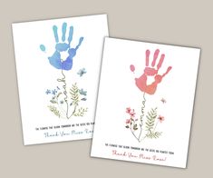 two cards with hand prints on them