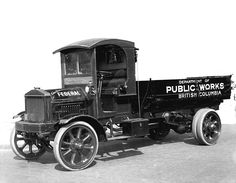 an old black and white photo of a public works truck in the early 1900's