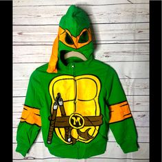 Ninja Turtles Graphic Sweatshirt Kids Playful Green Tops For Winter, Cute Green Hooded Top, Playful Winter Tops For School, Playful Winter School Tops, Playful Winter Tops With Character Print, Fun Winter Playwear Tops, Fun Winter Tops For Playwear, Ninja Turtle Shirt, Girl Sweatshirts