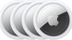 four white apple products are shown in this image