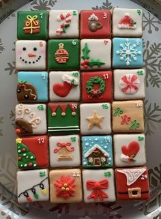 decorated cookies arranged in the shape of a christmas tree