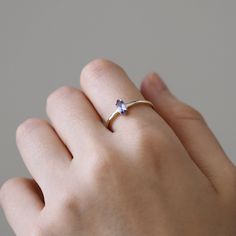 Tanzanite Solitaire Ring, Marquise Tanzanite Ring, 14K Solid Gold Ring, Tanzanite Stone Solitaire Ring, Minimalist Ring, Gifts for Her ≫ Product Details ◈ Handmade / Handcrafted Fine Jewelry ◈ Stone: 100% Natural Tanzanite ◈ Stone Size: 7mm x 3.6mm (0.35 ct) ◈ Band Thickness: 1.5mm ◈ Metal: Solid 14K Gold ◈ Gold Color: White gold, Rose gold, Yellow gold ≫ Please read our FAQ below for more detail. Small Tanzanite Ring, Timeless Tanzanite Rings As Gift, Minimalist Topaz Gemstone Ring For Everyday Wear, Minimalist Amethyst Ring For Anniversary, Minimalist Topaz Ring For Everyday, Tanzanite Solitaire Ring Gift, Dainty Tanzanite Birthstone Jewelry, Classic Tanzanite Solitaire Ring, Minimalist 14k Gold Amethyst Ring