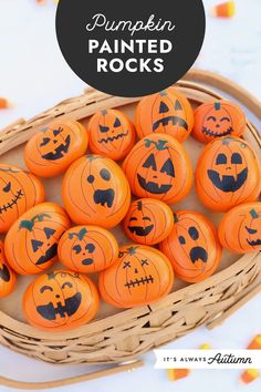 pumpkin painted rocks in a basket with text overlay that reads, pumpkin painted rocks