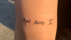 the word i am you written on someone's leg