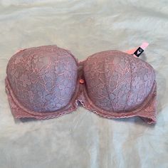 So Pretty, This Dream Angels Lined Demi Bra In Sweet Lavender With Peach Accents. All Over Lace, Including Sides. Peach Scalloped Edging, Adjustable Peach Straps. Back Close. Center Rose. Underwire. Approx. Cup Padding Is 3/8" Throughout. Designed For Uplifting And Cleavage. New, Never Worn. Size 38c. Victoria's Secret Feminine Purple Bra, Feminine Purple Bra, Victoria's Secret Lavender Underwire Bra, Feminine Fitted Purple Bra, Fitted Feminine Purple Bra, Victoria's Secret Purple Bra For Spring, Feminine Purple Underwire Bra, Feminine Fitted Lavender Bra, Lavender Feminine Bra