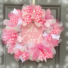 "Pretty in Pink" Celebrate your bundle of joy with this pink and white deco mesh wreath. This wreath is absolutely "Pretty in Pink" with multi-color pinks and white ribbon and bow. The handmade pink wooden sign read's "It's A Girl" in white acrylic paint. Baby Door Wreaths, New Baby Wreath, Skeleton Wreath, Baby Shower Wreath, Baby Wreath, Jessica Brown, Baby Door, Its A Girl