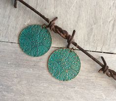 Turquoise verdigris patina earrings.. Romantic, vintage chic, boho Statement earrings I have used solid brass, antiques bronze plated ear wires. All earring hooks are nickel free. Earring length from top of hook to bottom of earring is 52mm. Each pieces are hand finished and may vary a little from pair to pair. Green Bohemian Jewelry With Vintage Charm, Vintage Green Patina Earrings, Bohemian Green Jewelry With Vintage Charm, Bohemian Earrings With Antique Finish For Jewelry Making, Bohemian Festival Earrings With Patina, Bohemian Patina Earrings, Bohemian Green Jewelry With Patina, Turquoise Patina Dangle Earrings, Turquoise Dangle Earrings With Patina