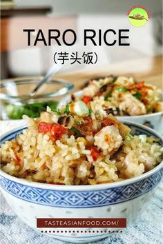 a bowl filled with rice and vegetables on top of a table