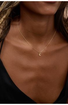 A dainty crescent moon pendant lends a hint of celestial gleam to this handcrafted chain necklace. 16" length 14k-gold fill Made in the USA Minimalist Crescent Charm Necklace With Clavicle Chain, Minimalist Crescent Clavicle Chain Charm Necklace, Delicate Crescent Moon Charm Necklace, Elegant Crescent Charm Necklace With Delicate Chain, Elegant 14k Gold Moon Charm Necklace, Elegant Half Moon Jewelry With Delicate Chain, Elegant Everyday Crescent Charm Necklace, Delicate 14k Gold Necklaces With Moon Charm, Minimalist Jewelry With Adjustable Half Moon Chain