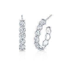 Elevate your style with our Diamond Open Ended Hoop Earrings, available in 18k white gold or 18k yellow gold. Sparkling round diamonds adorn these exquisite earrings, adding a touch of luxury and sophistication to any ensemble. Make a statement with these timeless beauties. Luxury Diamond White Hoop Earrings With Sparkling Stones, Luxury White Hoop Earrings With Pave Setting, Luxury White Diamond Cut Hoop Earrings, High-quality White Gold Hoop Diamond Earrings, Luxury White Diamond-cut Hoop Earrings, Open Ended, Diamond Hoop Earrings, Oval Diamond, White Gold Diamonds