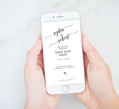 a person holding an iphone in their hands with the text save our date on it