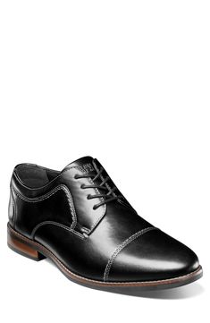 Clean topstitching lends handsome style to this sleek derby shaped by a classic cap toe. Synthetic upper and lining/rubber sole Imported Classic Black Derby Oxford Shoes, Classic Black Oxford Derby Shoes, Classic Black Oxford Derby, Casual Cap Toe Dress Shoes With Leather Footbed, Classic Black Derby Shoes For Business Casual, Fitted Black Derby For Workwear, Casual Dress Shoes With Plain Toe, Casual Fitted Dress Shoes With Plain Toe, Classic Black Derby Shoes With Goodyear Welt