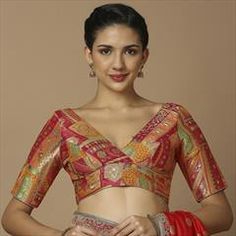 Red and Maroon color Blouse in Brocade fabric with Weaving work Luxury Red Blouse Piece With Kalamkari Print, Red Blouse With Zari Work For Transitional Season, Red Brocade Blouse Piece For Festive Occasions, Transitional Red Blouse With Pallu, Red Transitional Blouse With Pallu, Red Tops With Motifs For Festivals, Festive Red Tops With Motifs, Red Unstitched Brocade Blouse Piece, Red Brocade Blouse Piece With Zari Work