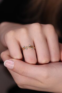 "Turquoise Gold Ring / Handmade Turquoise Ring / Turquoise Jewelry / 14k & 18k Gold Turquoise Ring Available in Gold, Rose Gold, White Gold ❥ ITEM DETAILS ---> Gold Color of Choice : Yellow Gold, Rose Gold, White Gold ---> Material : 14k ( 585 ) or 18k ( 750 ) Real Gold. It is not Gold Filled or Gold Plated ---> Made to order ---> Band Thickness : 1.10 mm ---> Band Width : 2.40 mm ---> Number of Turquoise: 4 pcs ---> Round Turquoise: 1.5 MM ---> Ship in 4 - 7 Business Days ❥ Gift Wrapping and Pa Handmade Turquoise Ring, Gold Turquoise Ring, Evil Eye Ring Gold, North Star Necklace, Turquoise Gold Ring, Ring Sets Boho, Star Necklace Gold, Ring Turquoise, Wrapped Earrings