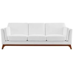 a white couch sitting on top of a wooden frame