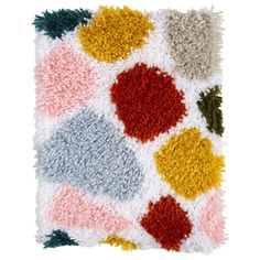 a multicolored rug with different shapes and sizes