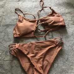 New Without Tags Camel/Tan Sexi Bikini Swimwear Bathing Suit Two-Piece. Size Tag Says Large But Fits Like A Small (Size 2/4). Ties Adjust On The Bra Front Side. Brown Swimwear With Built-in Bra For Pool, Brown Lined Swimwear For Poolside, Poolside Brown Lined Swimwear, Brown Swimwear With Lined Body For Pool, Brown Swimwear With Built-in Bra For Beach Season, Brown Summer Swimwear With Built-in Bra, Brown Lined Swimwear For Pool, Brown Lined Swimwear For Beach, Brown Triangle Top Swimwear With Built-in Bra